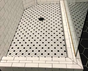 Bathroom floor tiles remodeled with details